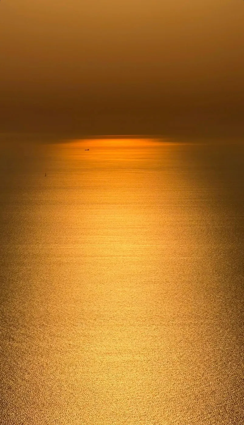 Golden evening light on the sea off the Costa del Sol