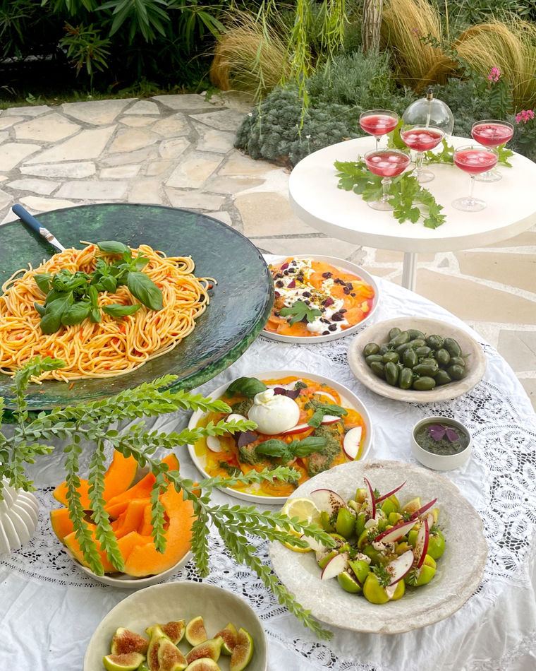 A table laid with many small dishes