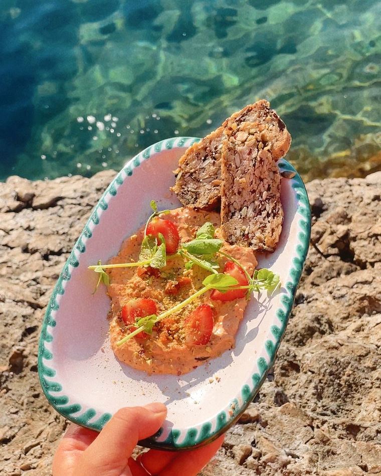 A plate of seafood by the water
